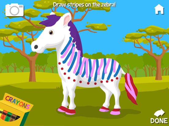 A zebra covered in hand-drawn colorful stripes beside a crayon control.