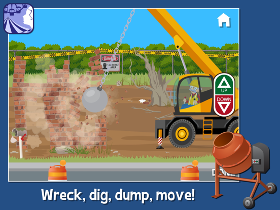 A dump truck empties material at a building site beside construction equipment.